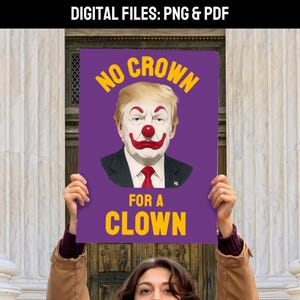 May include: A person holds a purple sign with the text "NO CROWN FOR A CLOWN." The sign features a caricature of a man with clown makeup. The image is set against a backdrop of a building with columns.