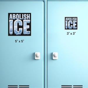 May include: Two blue locker doors with white handles. On the left door is a 5" x 5" square sticker that says "ABOLISH ICE" in white letters with a blue and white ice graphic. On the right door is a 3" x 3" square sticker that says "ABOLISH ICE" in white letters with a blue and white ice graphic.