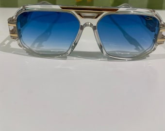 CAZAL 675 Sunglasses: Sky Blue Lens, Crystal-Clear Retro Frame Glasses For Women/ Men