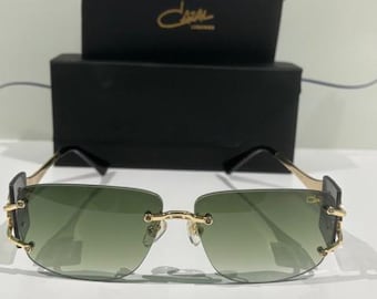 CAZAL 9095 Rimless Sunglasses: Green Lens, Black & Gold Frame