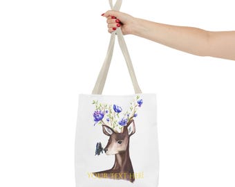 May include: White canvas tote bag with a brown deer with purple flowers on its antlers and a butterfly on its nose. The text "YOUR TEXT HERE" is printed on the bag.