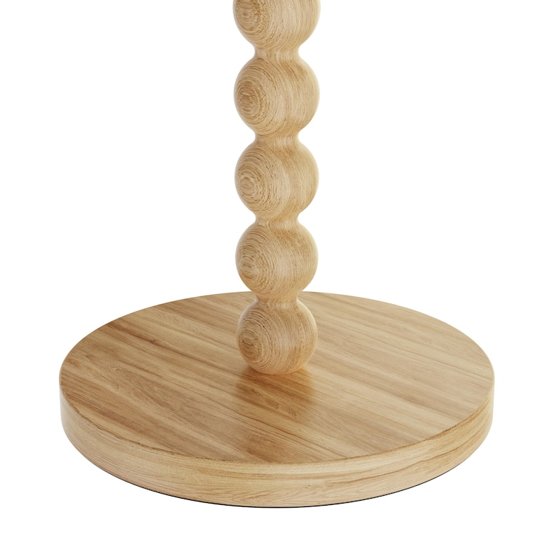 May include: A light-colored wooden stand featuring a circular base and a vertical support column composed of a stack of five smooth, spherical wooden balls. The natural wood grain is visible throughout the entire structure of the object.