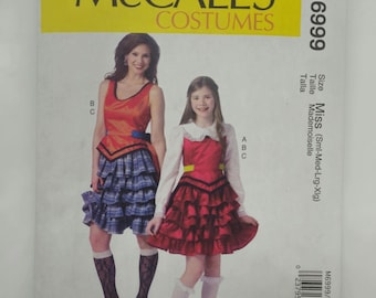 Molde para Costura de Fantasia com Babados McCall's M6999, Tamanhos Feminino e Infantil, P-GG