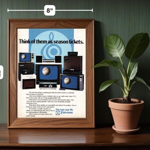 May include: A framed advertisement for Emerson televisions featuring a variety of televisions with a baseball theme. The ad copy reads "Think of them as season tickets." and "Fine tune your life. Emerson."