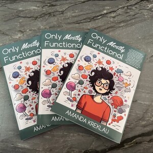 May include: Three copies of a book titled "Only Mostly Functional" are displayed. The cover features an illustration of a person with glasses and curly hair, surrounded by colorful doodles. The author's name, Amanda Kreklau, is printed below the illustration.
