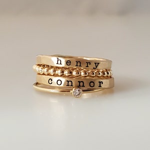 Gold stackable rings

Stacking Name Rings | Stackable Rings | Personalized Name Rings | Mother's Day Gift for Mom | Mom Rings | Children Names | Gold filled