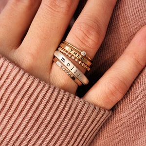 Up close look at a ring set on a models hand.
Stacked Name Rings | Stackable Rings | Design Ring Set|Personalized Mom Gift | Stacking Custom Rings | Easter Gift for Her