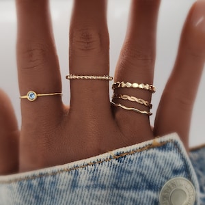 Up close look at a ring set on a models hand

Stacked Name Rings | Stackable Rings | Design Ring Set|Personalized Mom Gift | Stacking Custom Rings | Easter Gift for Her