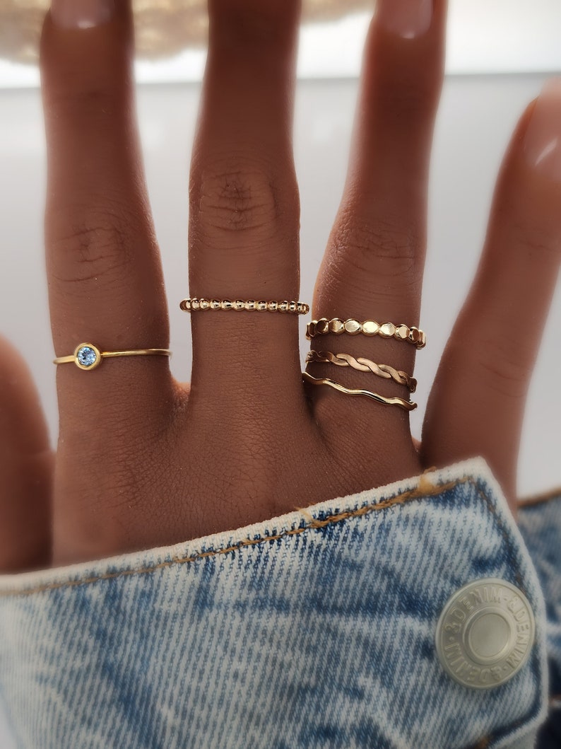 Up close look at a ring set on a models hand

Stacked Name Rings | Stackable Rings | Design Ring Set|Personalized Mom Gift | Stacking Custom Rings | Easter Gift for Her