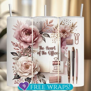 May include: White tumbler with a floral design featuring pink peonies and foliage. The tumbler includes the text "The Heart of the Office" and office-themed graphics. It also has a silver straw.