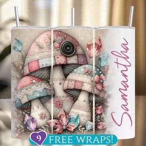 May include: A personalized tumbler featuring a whimsical mushroom design in pastel pink, blue, and beige tones. The design includes floral accents, gemstones, and the name "Samantha" in a cursive script. The tumbler has a silver straw.