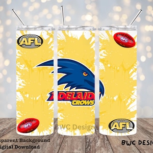 Könnte beinhalten: Ein gelber und weißer Becher mit einem blau-schwarzen Adelaide Crows Logo und den Worten "Adelaide Crows" und "AFL".