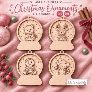 Pode incluir: Quatro enfeites de Natal de madeira cortados a laser em forma de globos de neve. Cada enfeite apresenta um personagem gravado diferente: um urso, uma rena, um boneco de gengibre e um rato. O texto diz Laser Cut Files Christmas Ornaments.