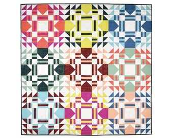 May include: A colorful quilt with a geometric pattern. The quilt features squares and triangles in shades of red, orange, yellow, green, blue, and pink, set against a white background. The quilt is bordered with a black edge.