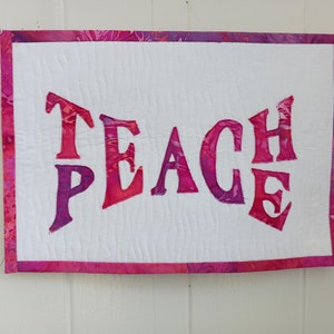 Teach Peace art quilt.