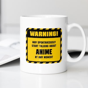 May include: White ceramic mug with a black and yellow warning label that reads "WARNING! MAY SPONTANEOUSLY START TALKING ABOUT ANIME AT ANY MOMENT."