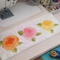 Three Rose Quilt Table Runner Pattern – Easy Floral Patchwork Spring Runner 3234T product logo