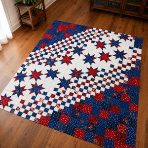 May include: A rectangular quilt featuring a patchwork design of red, white, and blue fabric squares. The pattern incorporates star shapes and small floral or dotted prints, creating a repeating geometric layout across the entire surface.