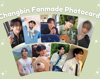 May include: Eight fanmade photocards featuring images of Changbin, arranged on a light green background. The text "Changbin Fanmade Photocards" is displayed in a white, rounded font.