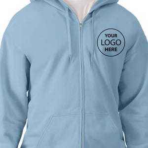 A light blue hooded sweatshirt with a black logo on the left side of the chest.