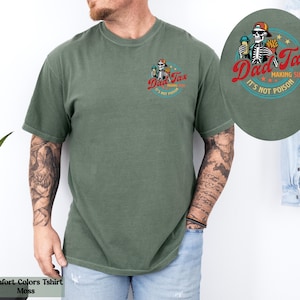 a man with a tattooed arm wearing a green shirt