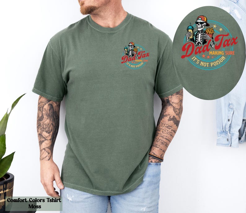 a man with a tattooed arm wearing a green shirt
