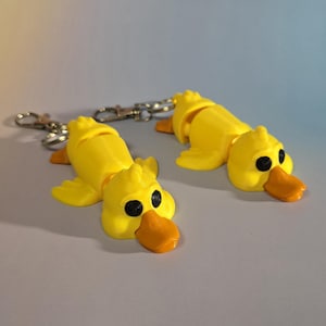 フレキシダックキーチェーン：関節式フィジェットトイ - 動物好きの方へのギフト