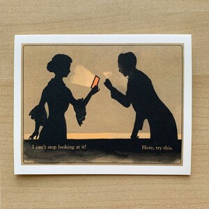 May include: Greeting card with a vintage-style illustration. Silhouetted figures of a woman holding a phone and a man with a cocktail glass. The text reads, "I can't stop looking at it!" and "Here, try this."