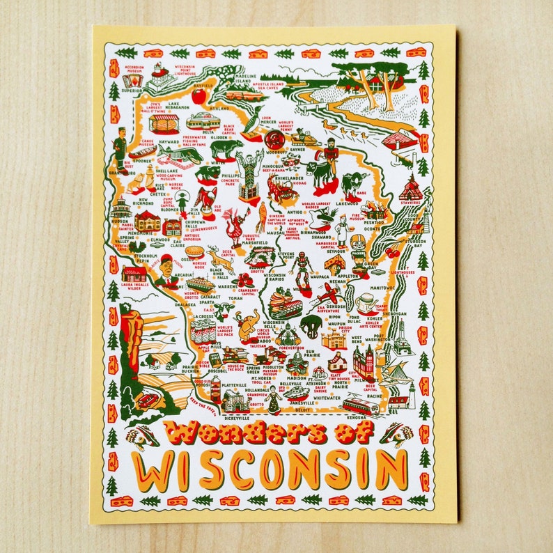 May include: A colorful map of Wisconsin with illustrations of landmarks and attractions. The map features the text "Wonders of Wisconsin" in orange and yellow, with a yellow border and a light yellow background.