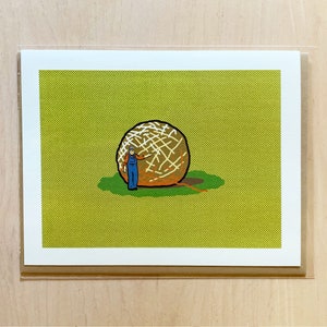 May include: A cartoon illustration of a person in overalls standing next to a large, round hay bale. The hay bale is brown and has white twine wrapped around it. The background is a green field.