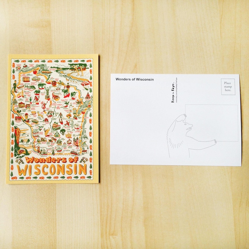 May include: A postcard featuring a colorful map of Wisconsin with illustrations of landmarks and attractions. The text "Wonders of Wisconsin" is displayed. The back of the postcard has a drawing of a bear holding a sign.