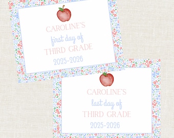 May include: Two rectangular cards with floral borders and apple illustrations. One card reads "CAROLINE'S first day of THIRD GRADE 2025-2026" and the other reads "CAROLINE'S last day of THIRD GRADE 2025-2026".