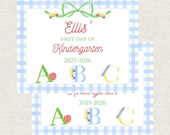 May include: A rectangular sign with a light blue gingham border featuring a green bow at the top. The text reads Ellis' FIRST DAY OF Kindergarten 2025-2026. Below, the letters A, B, and C are displayed with a red apple, a yellow bus, and a blue crayon.