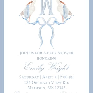 May include: Baby shower invitation with a light blue border. The invitation features two storks carrying blue bundles, a large letter "W", and a blue ribbon. Text includes "Join us for a baby shower honoring Emily Wright."