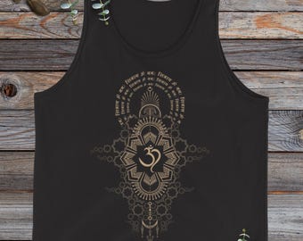 May include: Black tank top featuring a detailed gold-colored Om symbol and intricate geometric patterns. The design includes text in a circular pattern around the top. The tank top is made of a soft material.