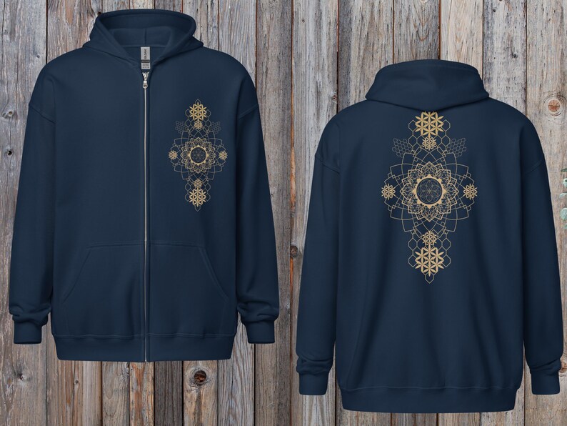 May include: A navy blue zip-up hoodie with a gold geometric mandala design on the front and back. The hoodie has a hood, a full-length zipper, and two front pockets. The design is symmetrical and features intricate patterns.