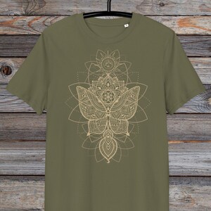 May include: A green t-shirt with a gold mandala design featuring a butterfly and geometric patterns.