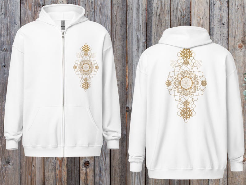 May include: White zip-up hoodie with a gold geometric mandala design on the front and back. The hoodie has a hood, a full-length zipper, and two front pockets. The design is symmetrical and features intricate patterns.