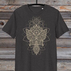 May include: A dark heather grey t-shirt with a gold mandala design featuring a butterfly and geometric patterns.