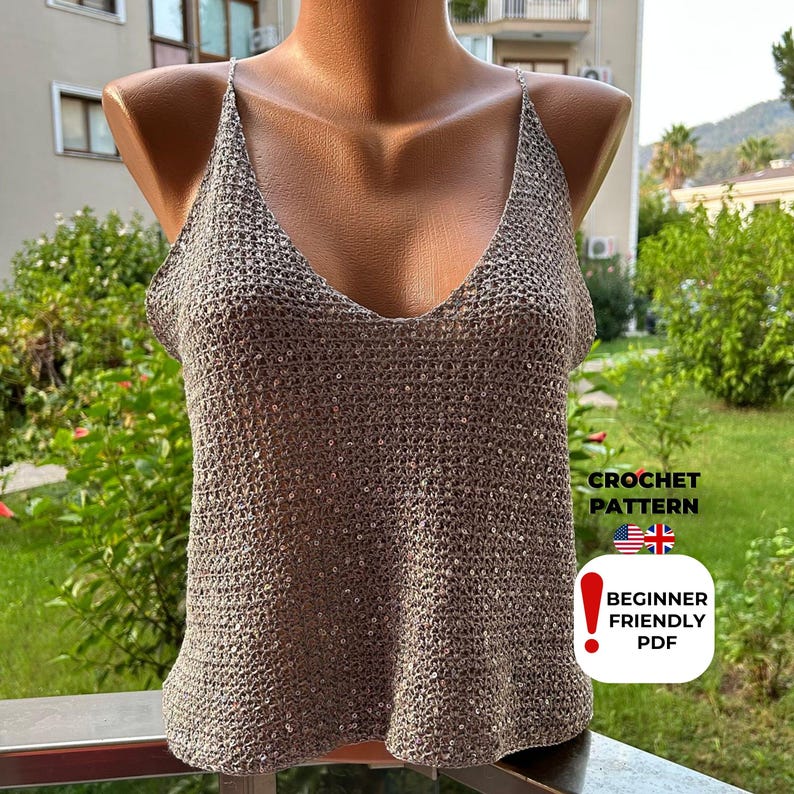 Close-up front view of sequin crochet blouse with V-stitch mesh pattern and elegant neckline, handmade from digital PDF pattern for boho summer fashion styling.