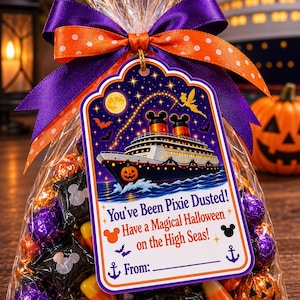 May include: A clear plastic treat bag filled with assorted sweets, including foil-wrapped chocolates and candy corn. A decorative tag features a cruise ship, a fairy, and the text: You've Been Pixie Dusted! Have a Magical Halloween on the High Seas!