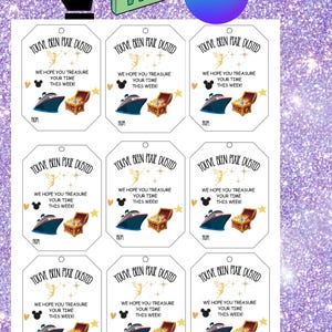 May include: A sheet of gift tags with a glittery purple background. Each tag features the text "YOU'VE BEEN PIXIE DUSTED" and a graphic of a ship, treasure chest, and fairy. The text "WE HOPE YOU TREASURE YOUR TIME THIS WEEK!" is also included.