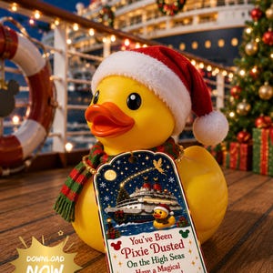 May include: A yellow rubber duck wearing a red and white Santa hat and a red and green striped scarf. A rectangular tag hangs from the duck, featuring an illustration of a cruise ship and the text: You've Been Pixie Dusted On the High Seas.