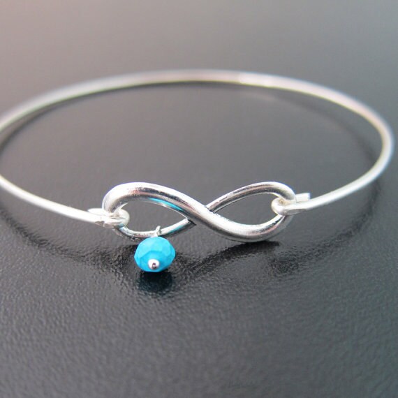 St Stephanie Charm On A 7 1/2 Inch Round Double Loop Bangle Bracelet St Stephanie Charm On A 7 1/2 Inch Round Double Loop Bangle Bracelet