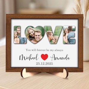 May include: A wooden framed photo with the word "LOVE" in large letters, each letter containing a photo of a couple. Below the word "LOVE" is the text "You will forever be my always", followed by the names "Michael" and "Amanda", a red heart, and the date "25.12.2025".
