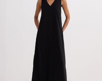 Crossed in Chic Sleeveless Maxi Dress in Black