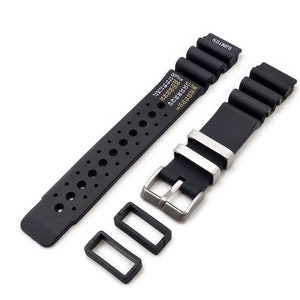 May include: Black rubber watch strap with a stainless steel buckle and two black keeper loops. The strap has a perforated design and the text "NO LIMITS" printed on the top.