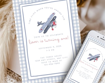 May include: A light blue and white gingham patterned invitation with a watercolor illustration of a gray airplane. The text reads "Time flies when you're having fun" and "Liam is turning one!" A smartphone displays the same design.