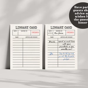May include: Two cream-colored library card-style guest book cards. One card is blank, the other has handwritten entries. The cards have the text "LIBRARY CARD" at the top, with fields for date, name, and advice. A circular graphic says "Have party guests share advice and wishes for the guest of honor."