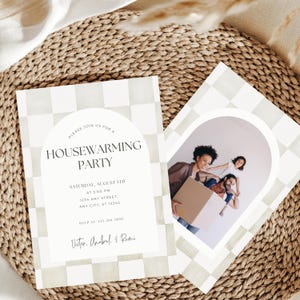 May include: A housewarming party invitation with a checkered background and a photo of a family in an arched frame. The invitation includes the text "Please join us for a housewarming party", "Saturday, August 5th at 5:00 PM", "1234 Any Street, Any City, ST 12345", "RSVP at 125 430 7890", and "Victor, Anabel, & Remi".